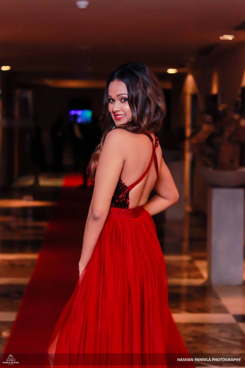 Anjali Vinodya Flashes In Red Dress